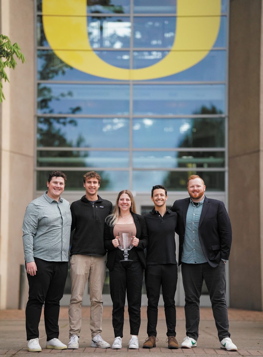 Team members Lauren Volzer, Brodi Sabiston, Quinn Van Horne, Coby Barbar and Michael Heinonen outside of the Lillis Business Complex. Eugene, on May 1st, 2024. (Eddie Bruning/Emerald)