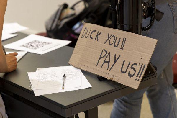 People check in before entering the room to sit in on the contract negotiations. The UO Student Workers met with the University of Oregon's bargaining team for their first day of union contract negotiations on May 29, 2024. (Alex Hernandez/Emerald)