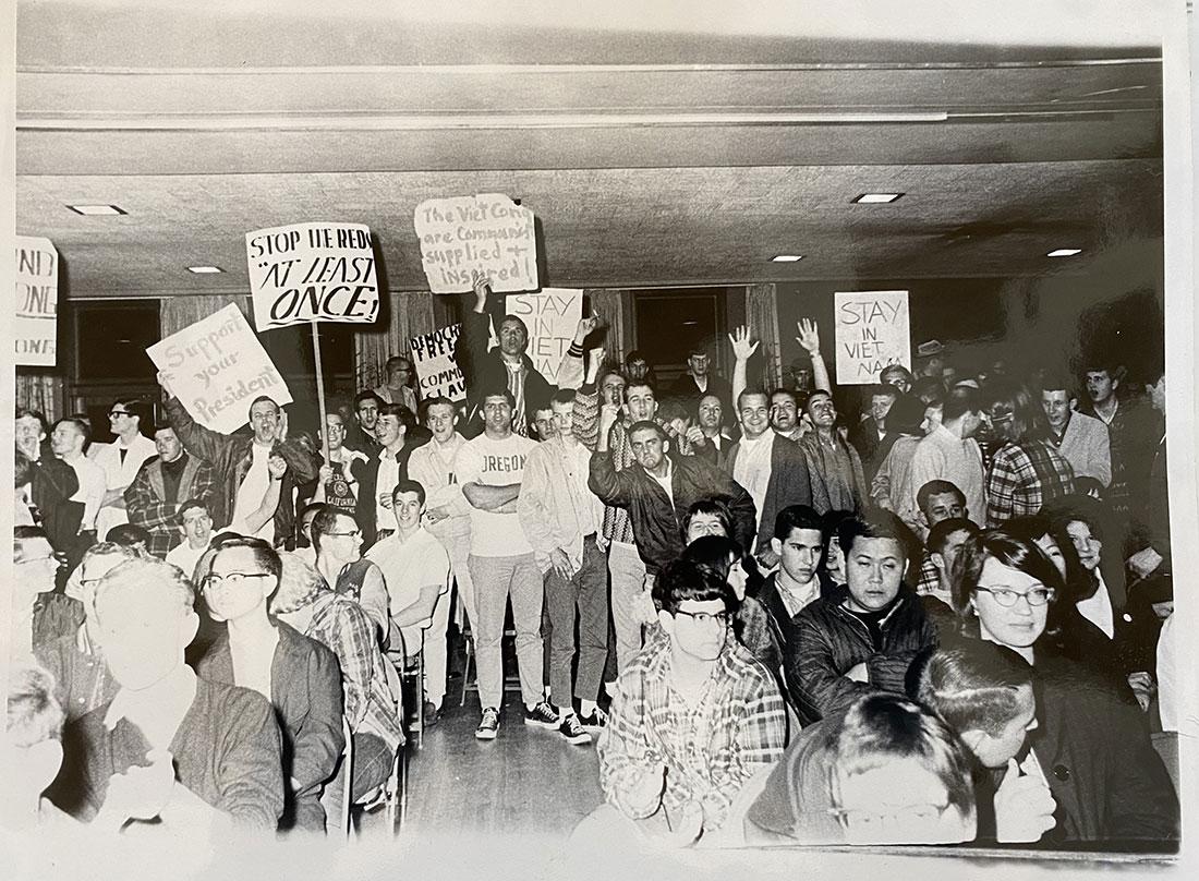 Pro War protestors demonstrate in the Erb Memorial Union. Complementary of Special Collections and University Archives, UA Ref 3 University Archives Photographs, Box 115 Folder &#8220;Student Activities - Protests&#8221;