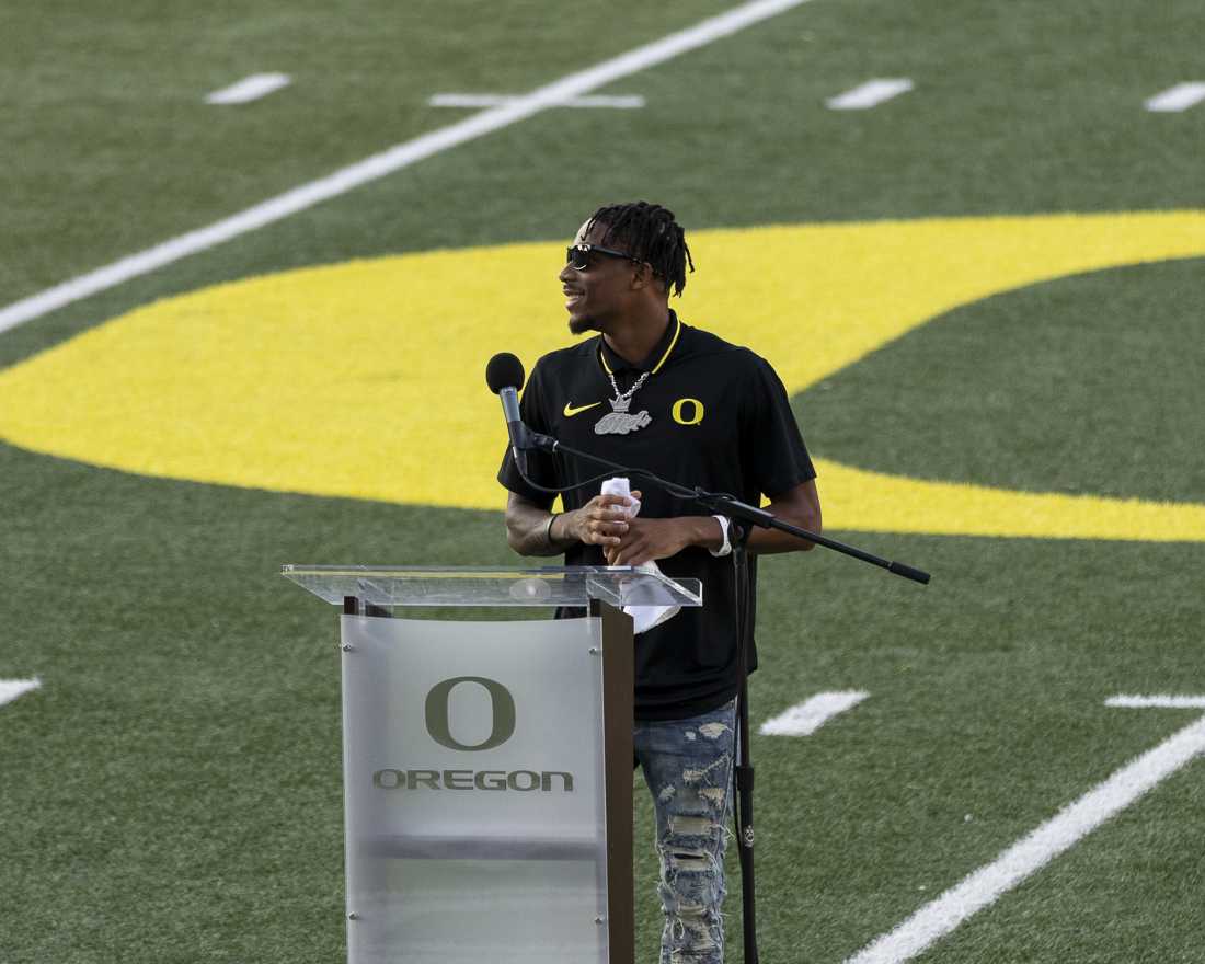 Oregon player Tez Johnson speaks at a vigil at Autzen Stadium in memory of former Oregon football player Khyree Jackson on July 10, 2024. (Alex Hernandez/Emerald)