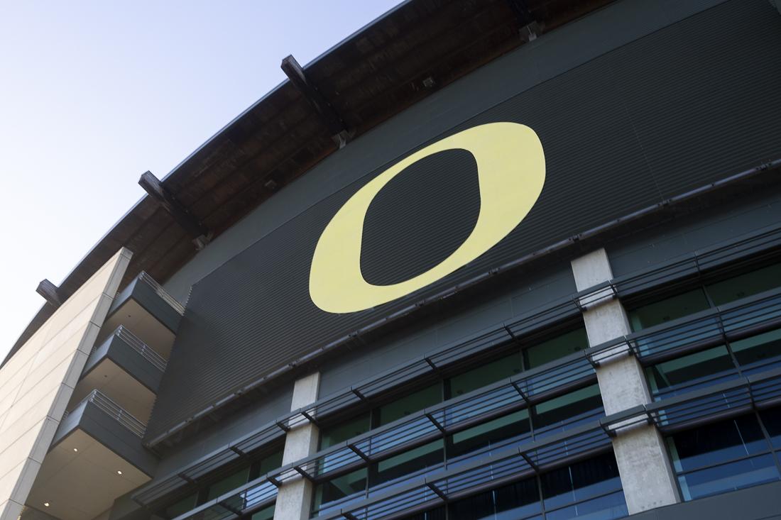 The sun begins to set on Autzen Stadium as family, friends and fans enter for a vigil in memory of former Oregon football player Khyree Jackson on July 10, 2024.