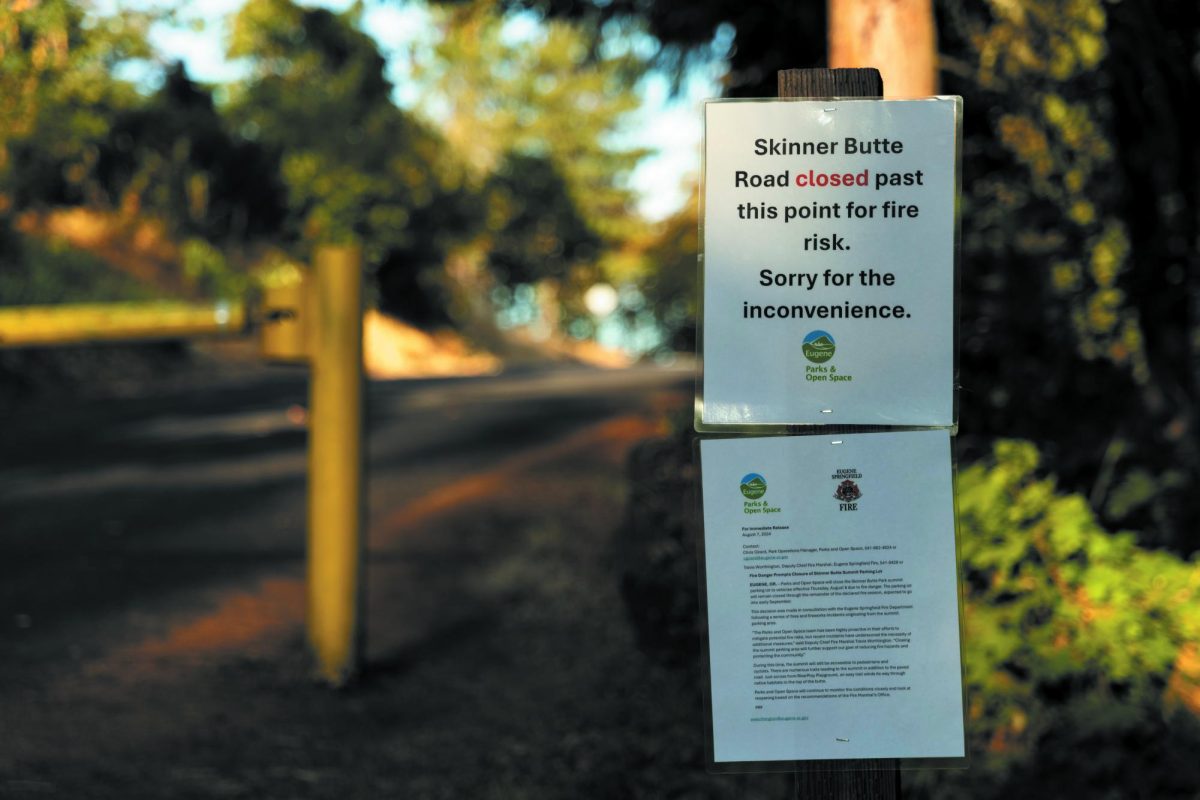 A barrier blocks the road to the top of Skinner Butte due to “fire risk” on 
August 12, 2024. (Alex Hernandez/Emerald)