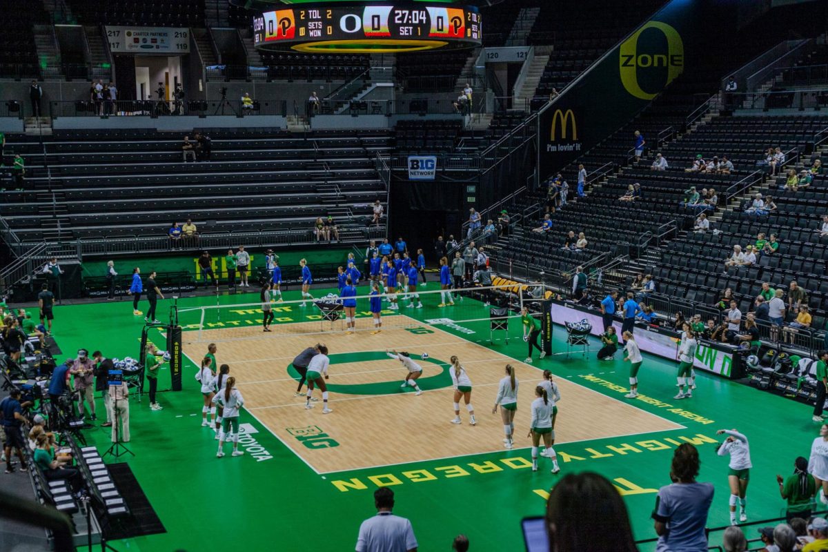 Both teams warm up inside the updated Matthew Knight Arena. The University of Oregon Ducks lost 3 sets to 0 against the University of Pittsburgh Panthers Friday. 