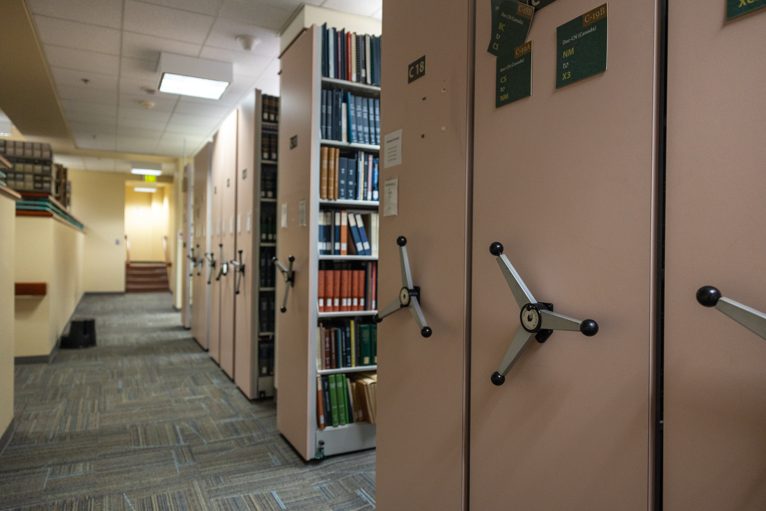 Rows and rows of shelving filled with reserach materials are available for Knight Library patrons to browse. (Molly McPherson/Emerald)