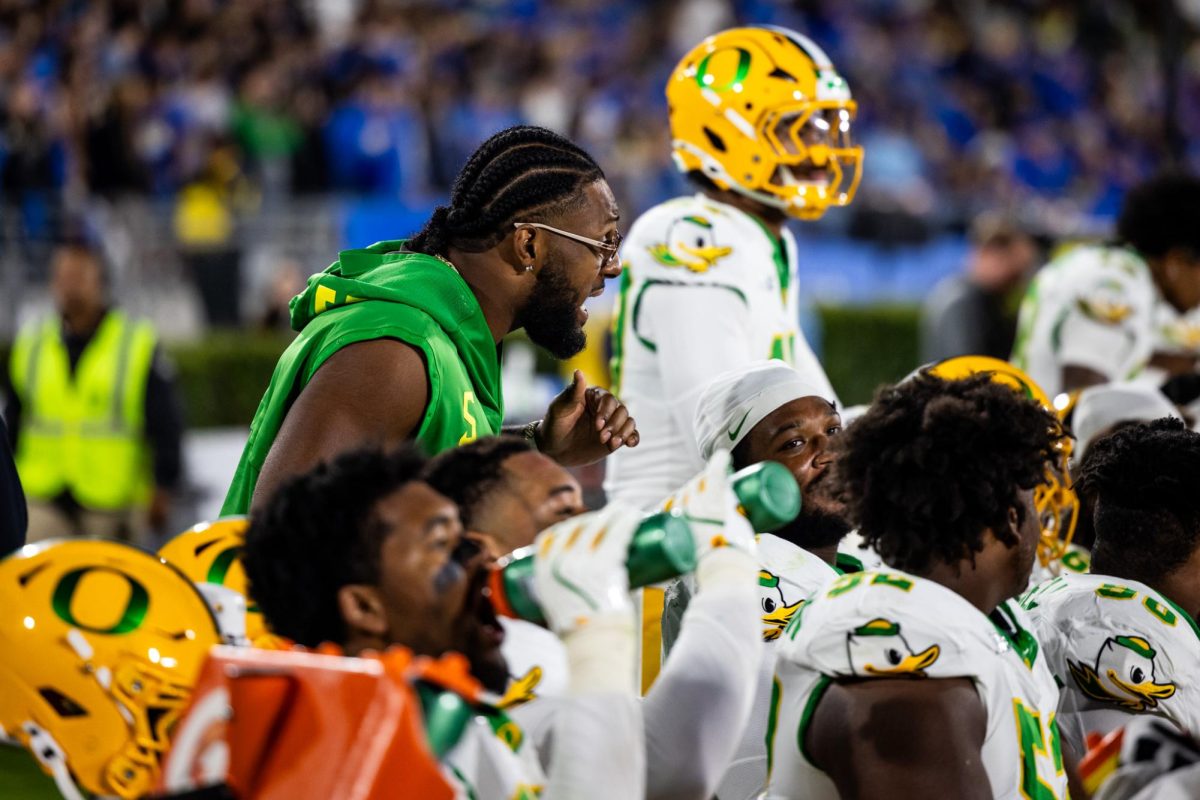 Former Oregon Duck and NFL first rounder, Kayvon Thibodeaux, coaches up the Duck defensive line unit. The Oregon Ducks take on the UCLA Bruins in its first Big Ten Conference game in the Rose Bowl in Pasadena, CA on Sept. 28, 2024. (Jonathan Suni/Emerald)