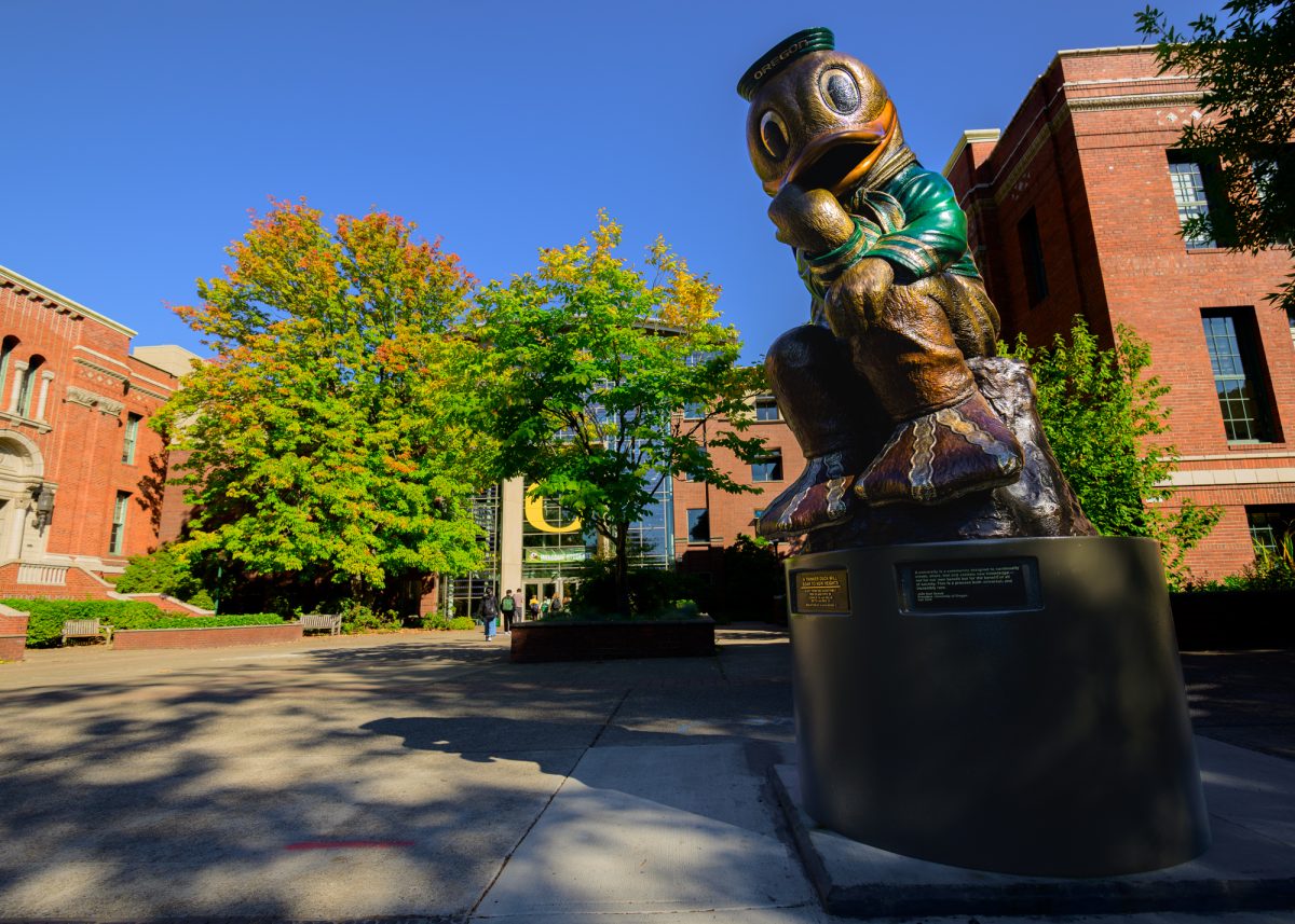 A statue of the Duck striking the famous "The Thinker" pose resides outside of the Lillis Business Complex at the University of Oregon in Eugene, Ore., on Oct. 1, 2024.  (Eric Becker/Emerald)