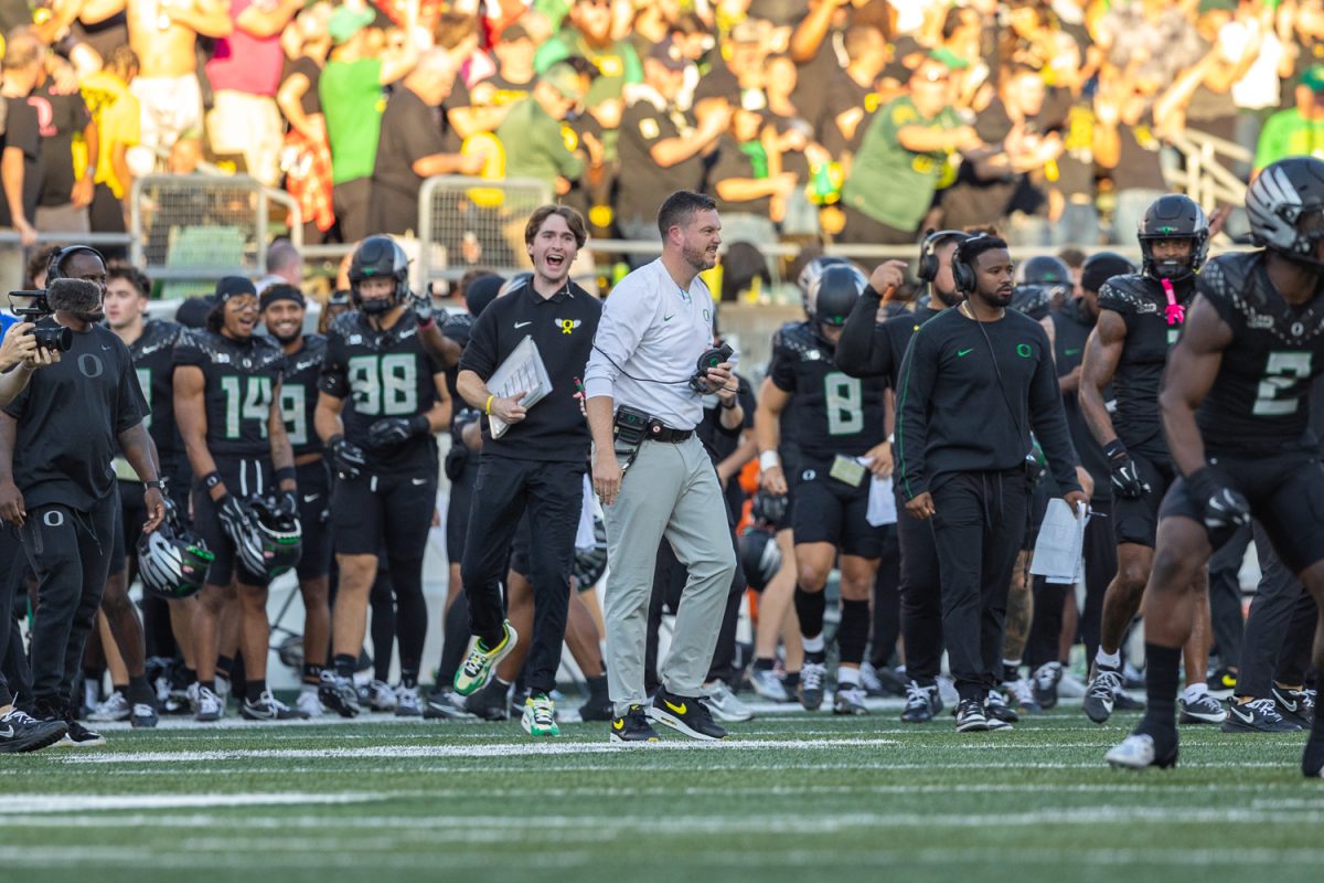 Head coach Dan Lanning on the sidelines. The number 3 ranked Oregon Ducks football team takes on the number 2 ranked Ohio State University Buckeyes on Oct. 12, 2024, at Autzen Stadium in Eugene, Ore. (Molly McPherson/Emerald)