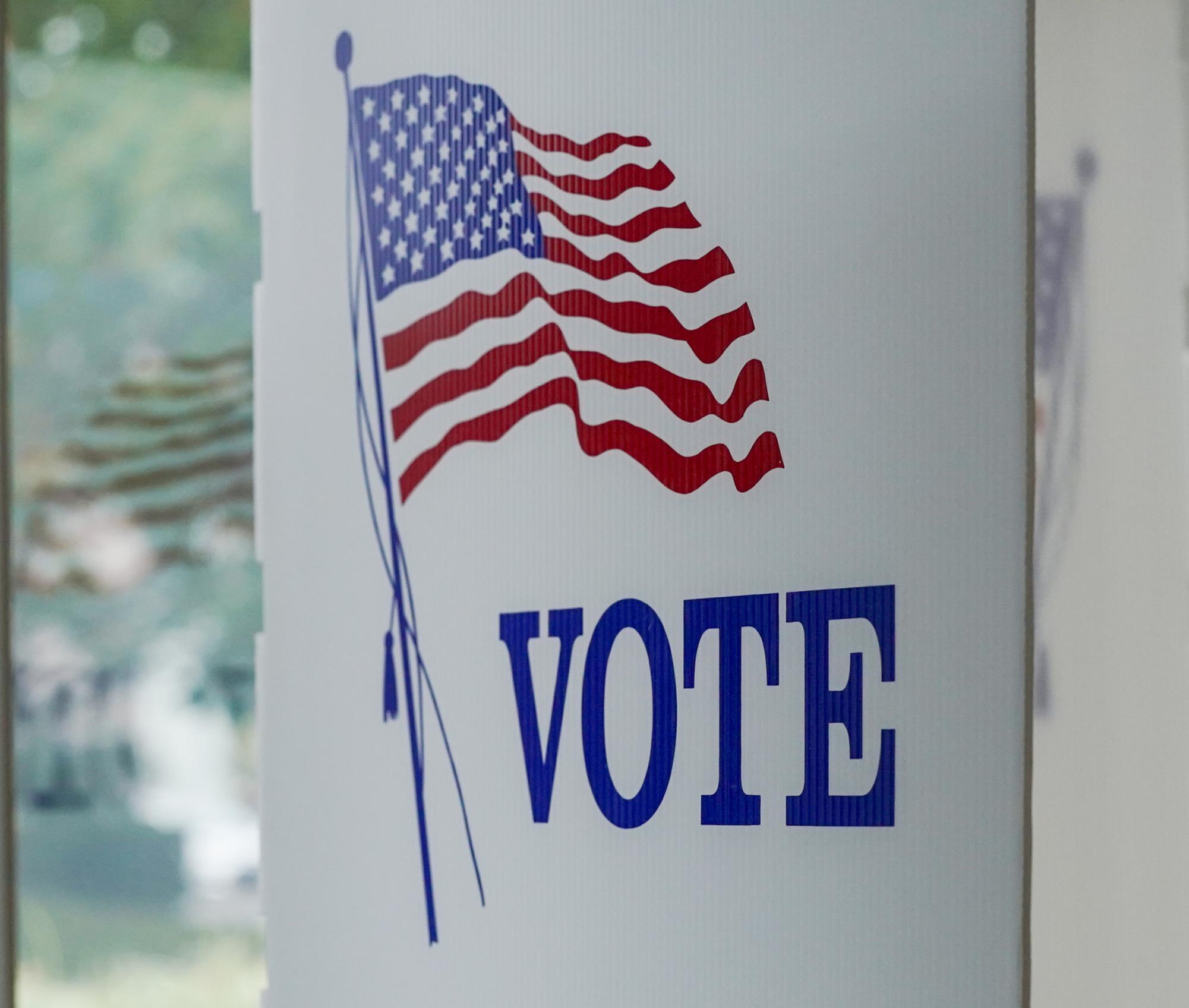 A close up of “VOTE” on the side of the voting booths. Election voting 2024, Eugene Oregon, Oct. 16 2024 (Eddie Bruning/Emerald)