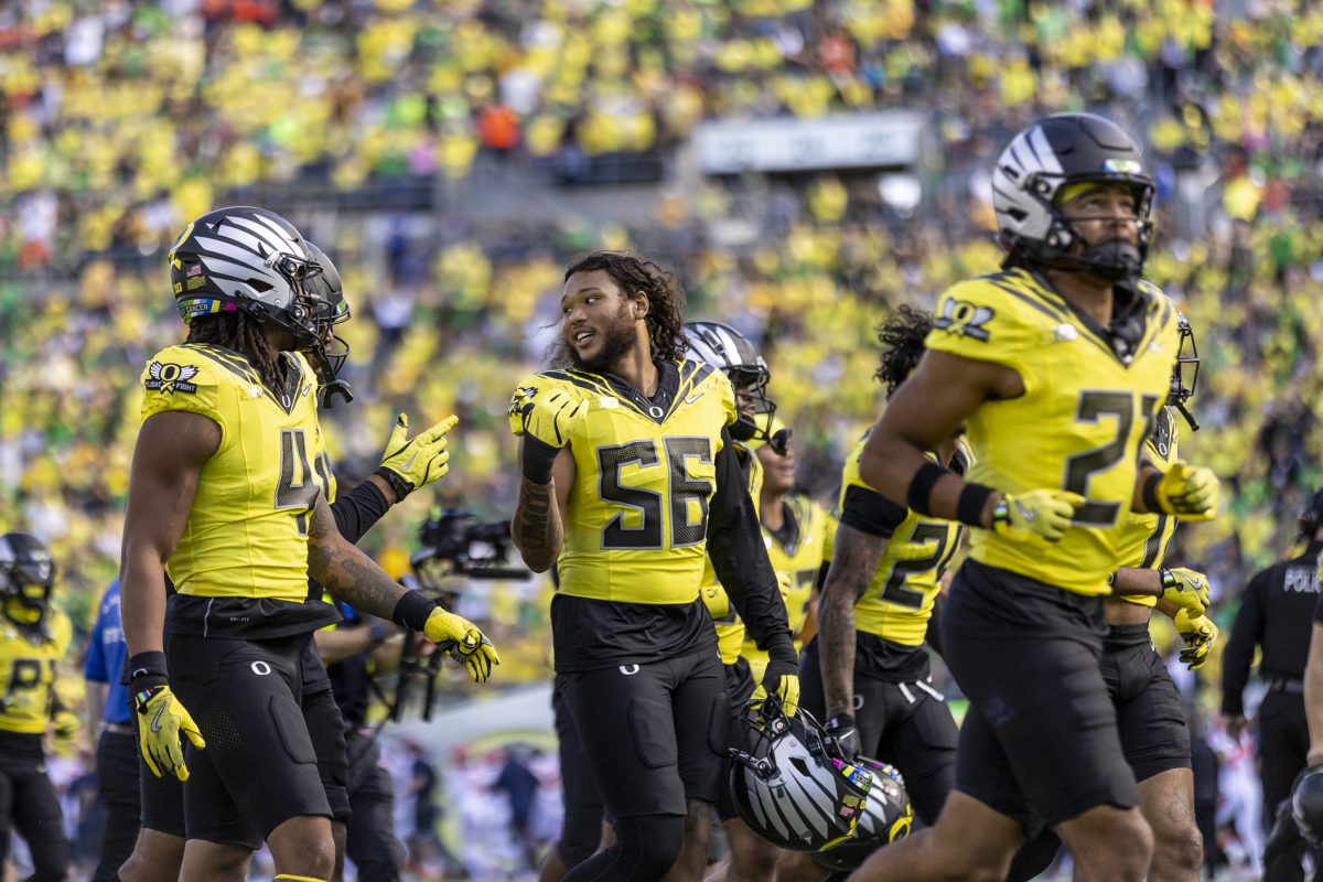 Oregon players run off the field at halftime during the game on Oct. 26, 2024. The No. 1 Oregon Ducks beat the No. 20 Illinois Fighting Illini 38-9. (Alex Hernandez/Emerald)