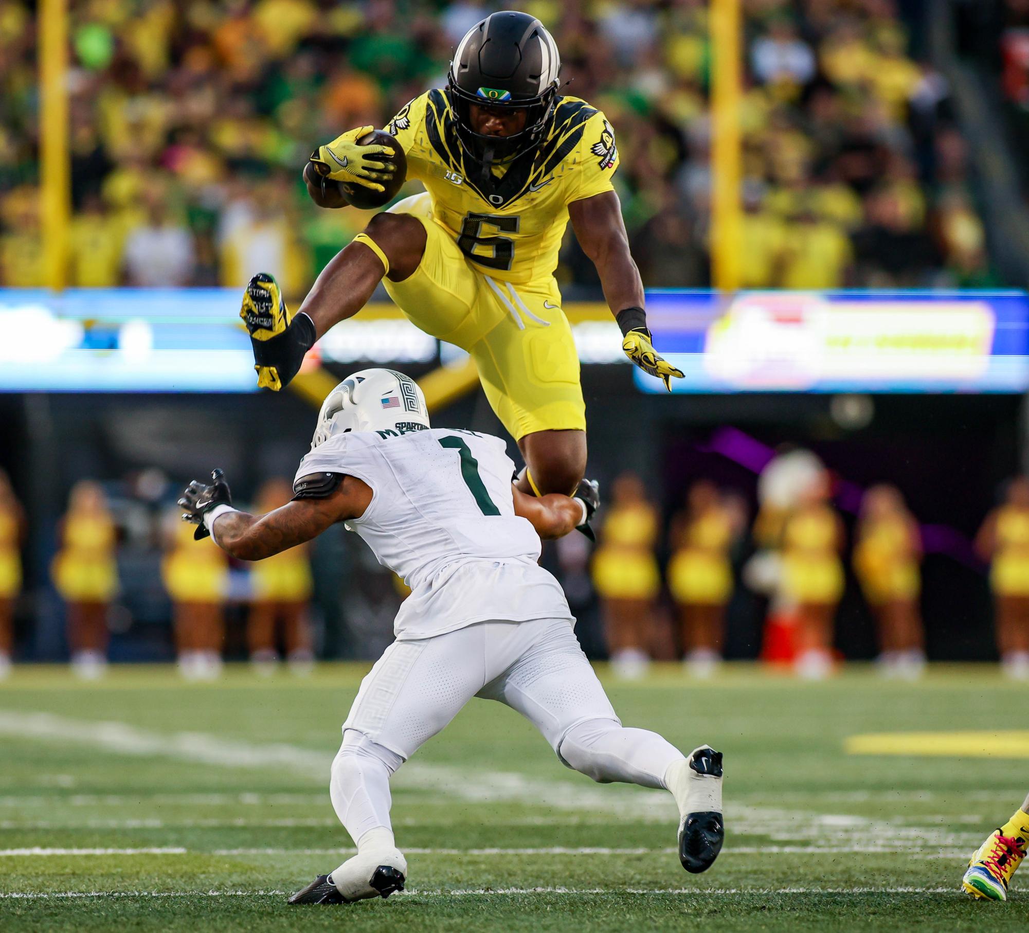 The University of Oregon wearing custom cancer awareness patches. University of Oregon takes on Michigan State University at Autzen Stadium, Eugene, October 4th 2024. (Eddie Bruning/Emerald)