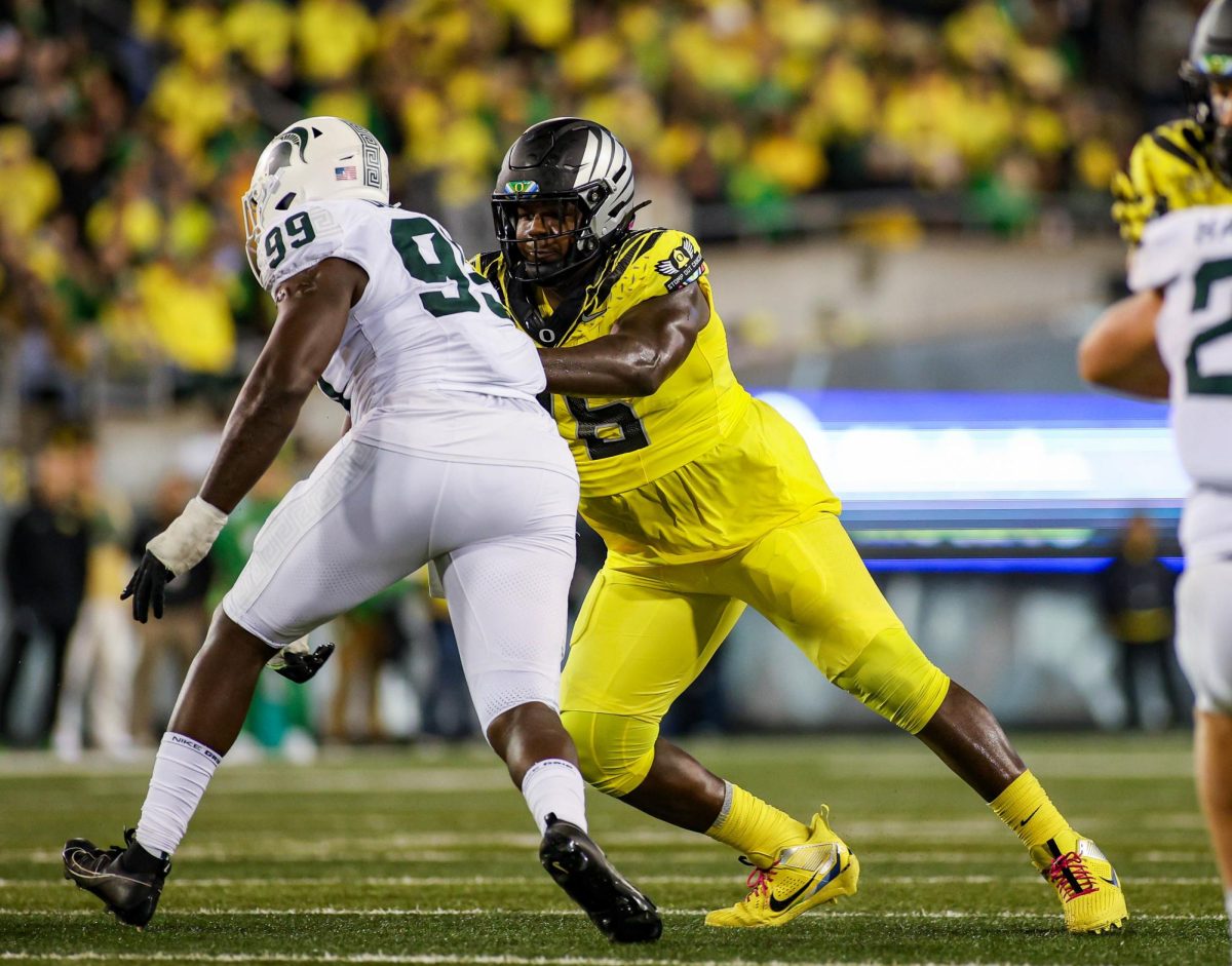 Josh Conerly Jr. (76) in pass protection. University of Oregon takes on Michigan State University at Autzen Stadium, Eugene, October 4th 2024. (Eddie Bruning/Emerald)