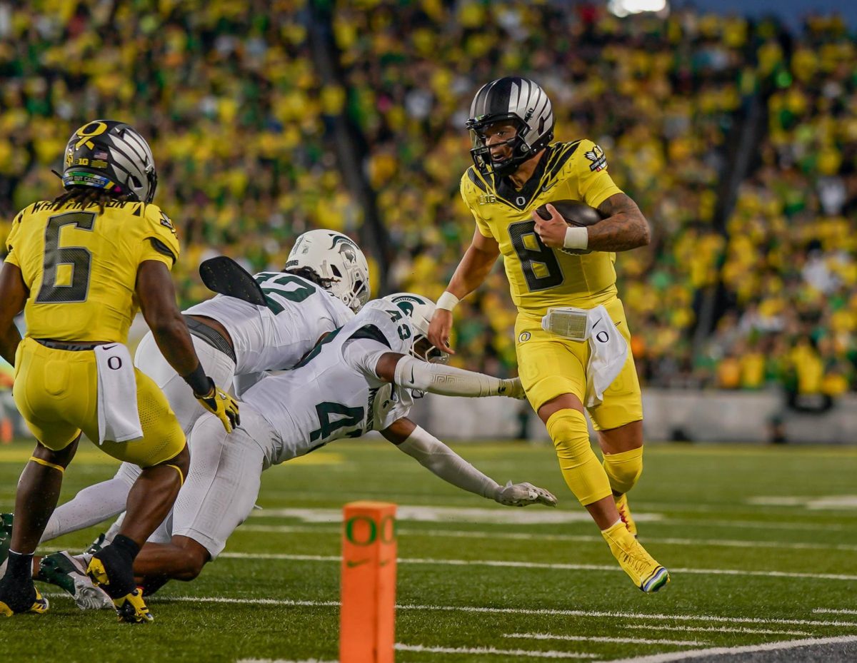 Dillon Gabriel (8) runs inside the Michigan State’s 10 yard line. University of Oregon takes on Michigan State University at Autzen Stadium, Eugene, October 4th 2024. (Eddie Bruning/Emerald)