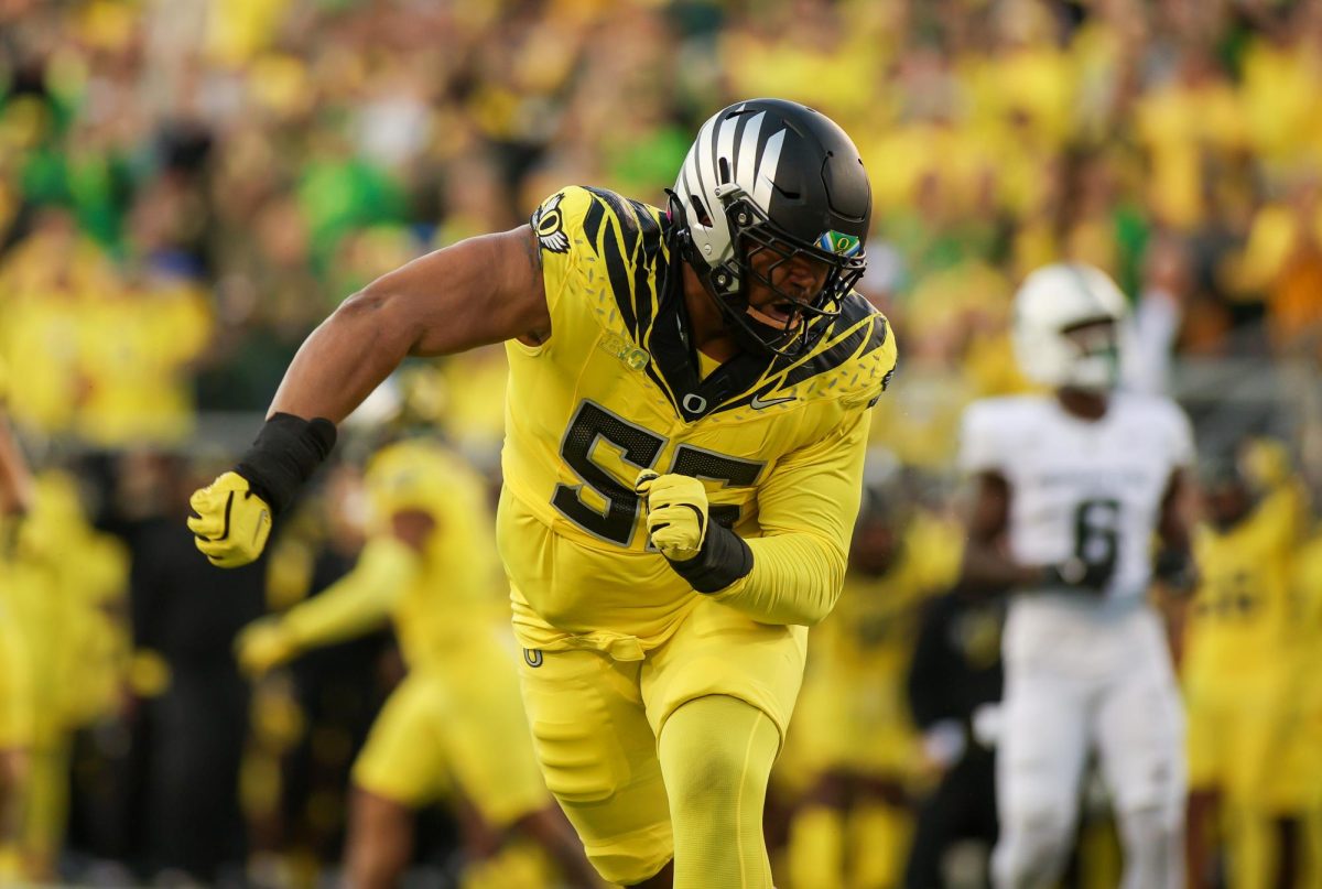 Defensive lineman Derrick Harmon celebrates a sack. The Oregon Ducks defeated the Michigan State Spartans 31-10 on October 4. Photo: Eddie Bruning