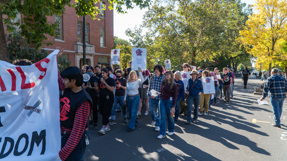 Students marching towards Johnson Hall to deliver President Scholz a letter of condemnation. (Saj Sundaram/Emerald)