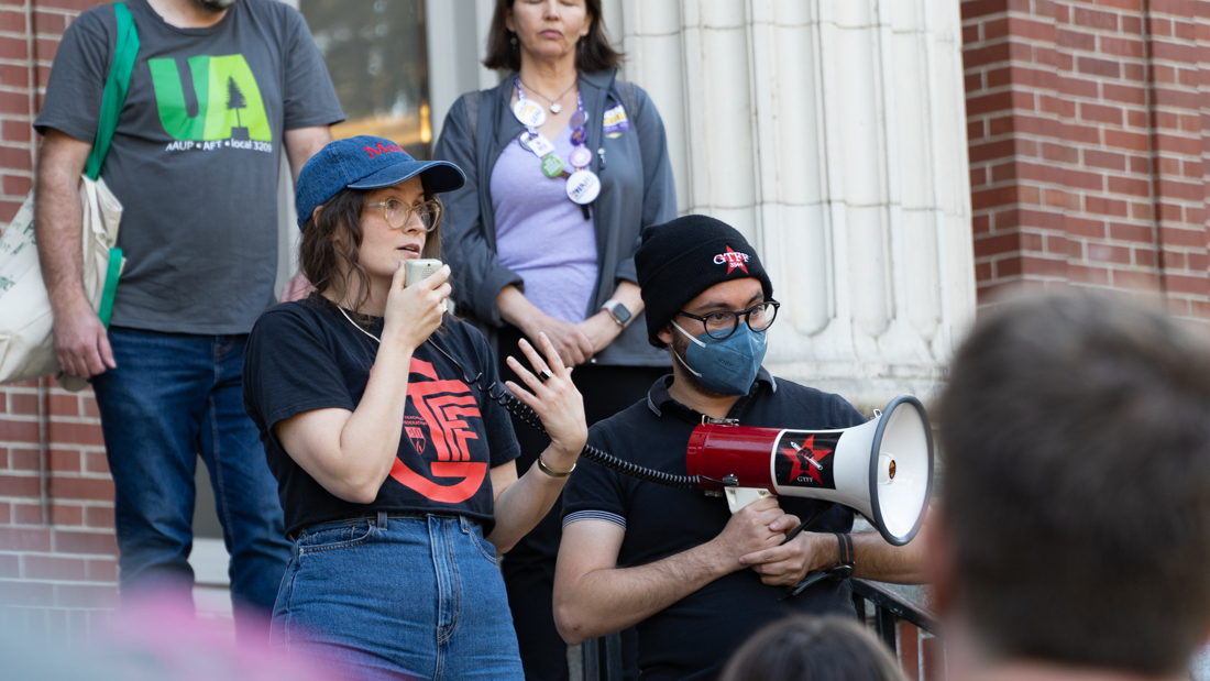 Presence O'Neal, GTFF President speaking to the crowd about being intercepted by Mark Schmelz, Chier HR Officer, before they were able to get to President Scholz office to deliver the letter of condemnation. (Saj Sundaram/Emerald)