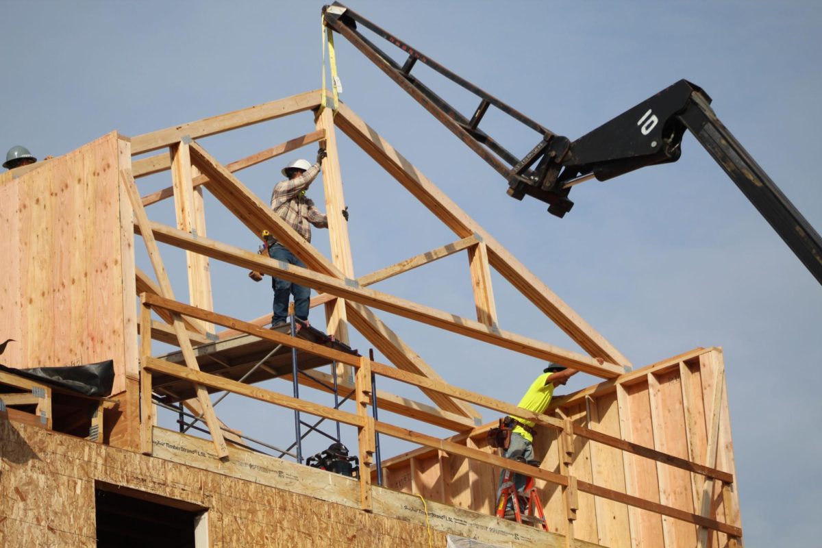 Construction workers renovate the former Red Lion hotel in Eugene.
(Mathias Lehman-Winters/Emerald)