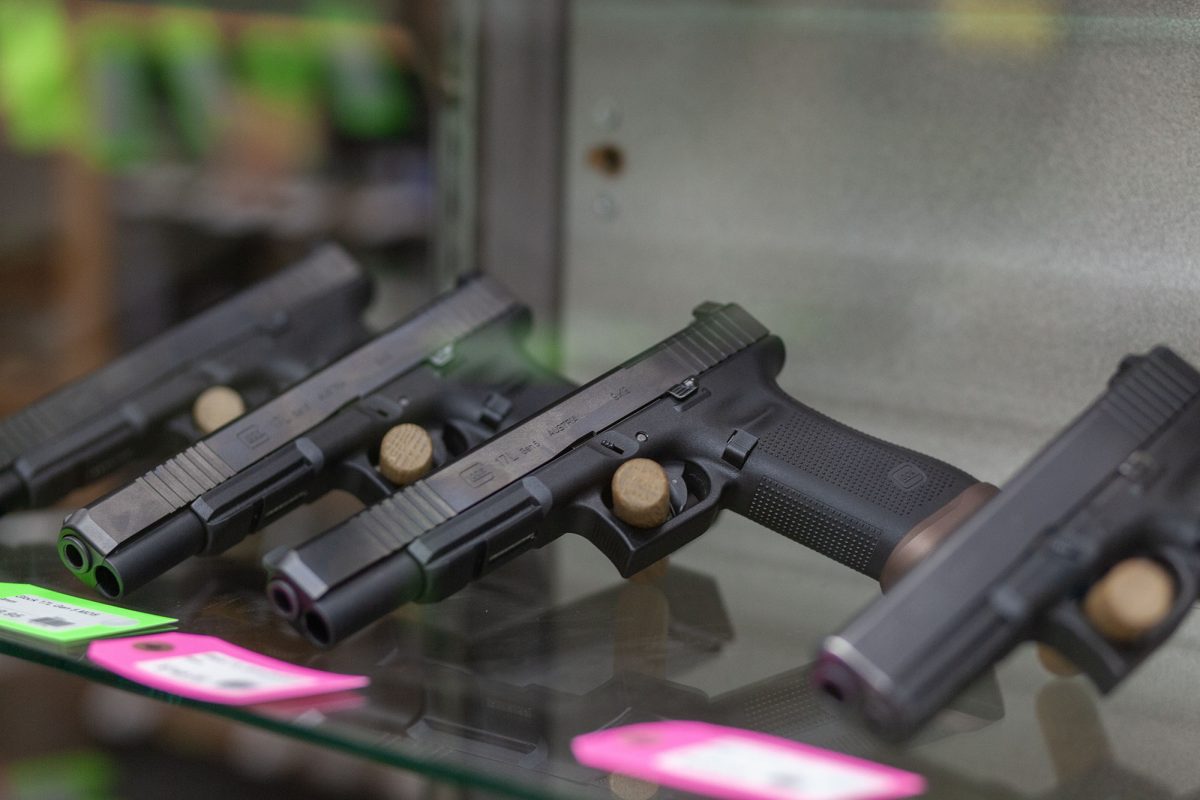 An array of firearms sit on display at Mazama Sporting Goods in Eugene Oregon. (Miles Cull/Emerald)