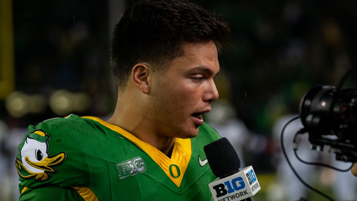 Dillon Gaberiel talking to a reporter from the B1G Ten Network after the game. The Oregon Ducks played against the Maryland Terrapins at Autzen Stadium in Eugene, Ore. on Nov. 9. (Saj Sundaram/Emerald)