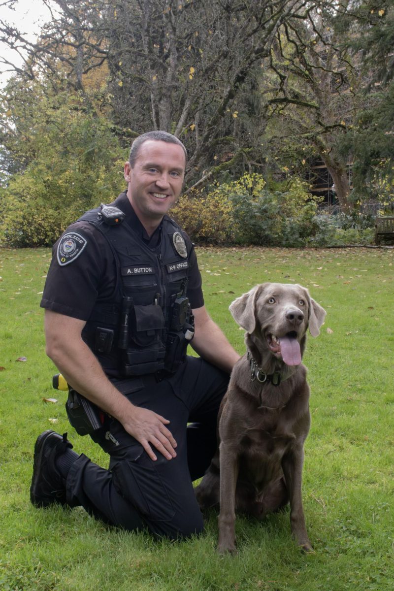  Officer Anthony Buttons and explosive detection K9 Thor are affiliated with the University of Oregon Police Department. (Alyssa Garcia/Emerald) 
 
