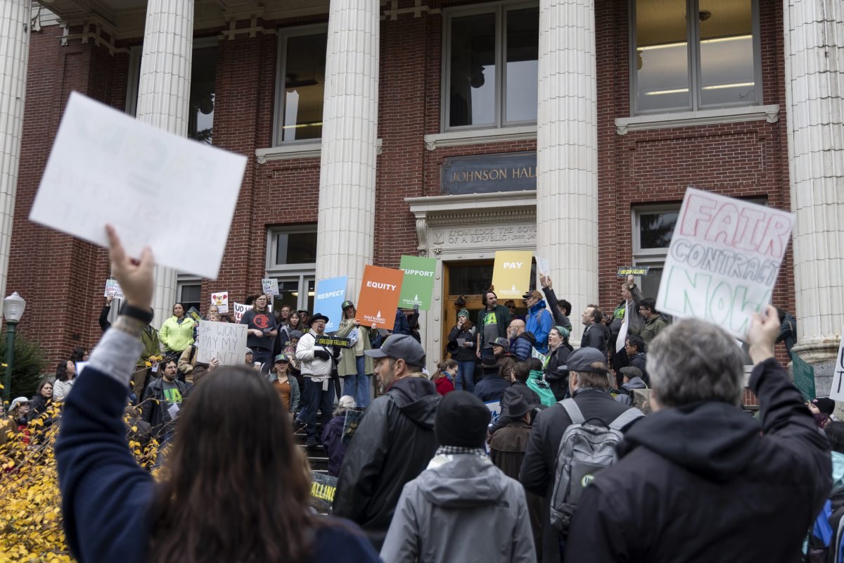 Mike Urbancic, United Academics president, speaks to demonstrators at a rally at Johnson Hall in support of the University of Oregon United Academics on Nov. 13, 2024. After the rally, demonstrators marched to Chiles Hall, where UO and UA teams met for a bargaining session. (Alex Hernandez/Emerald)