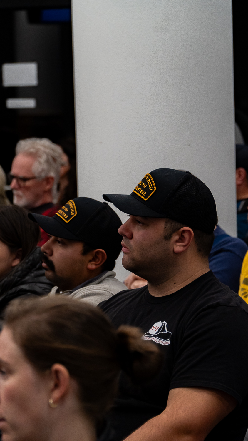 Firefighters attend a public hearing on Nov. 18 on the proposed fire safety fee. (Saj Sundaram/ Emerald)