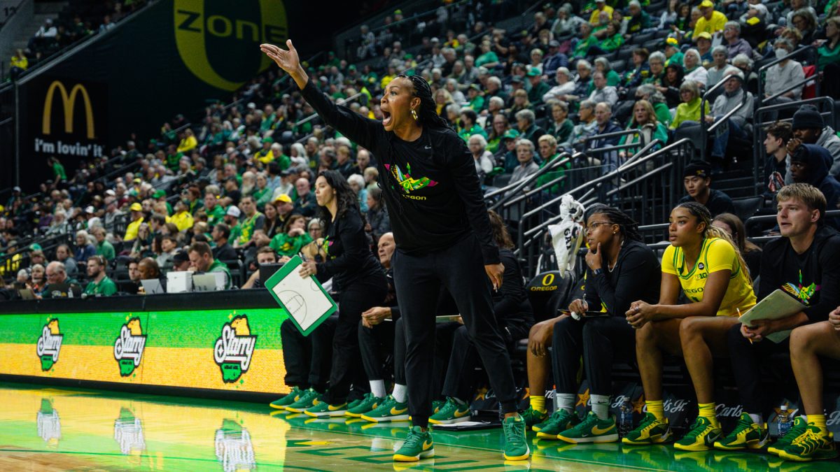 Assistant Coach Jerise Freeman yells at her players at Matthew Knight Arena on Nov. 20, 2024, in Eugene, Ore. (Jordan Martin/Emerald)