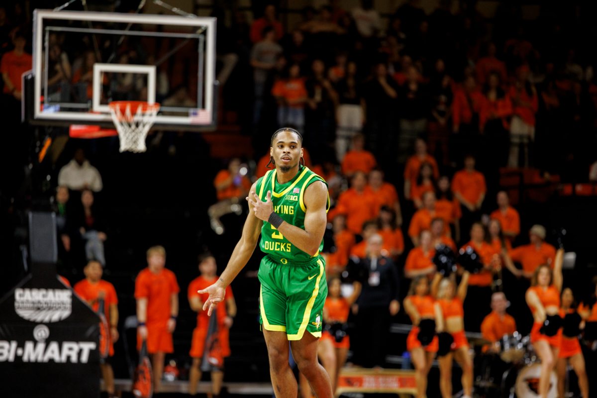 Keeshawn Barthelemy (9) Celebrates his 3 The Oregon Ducks mens basketball team takes on the Oregon State Beavers on Nov. 21, 2024 in Gill Coliseum in Corvallis, Ore. (Darby Winter/Emerald)