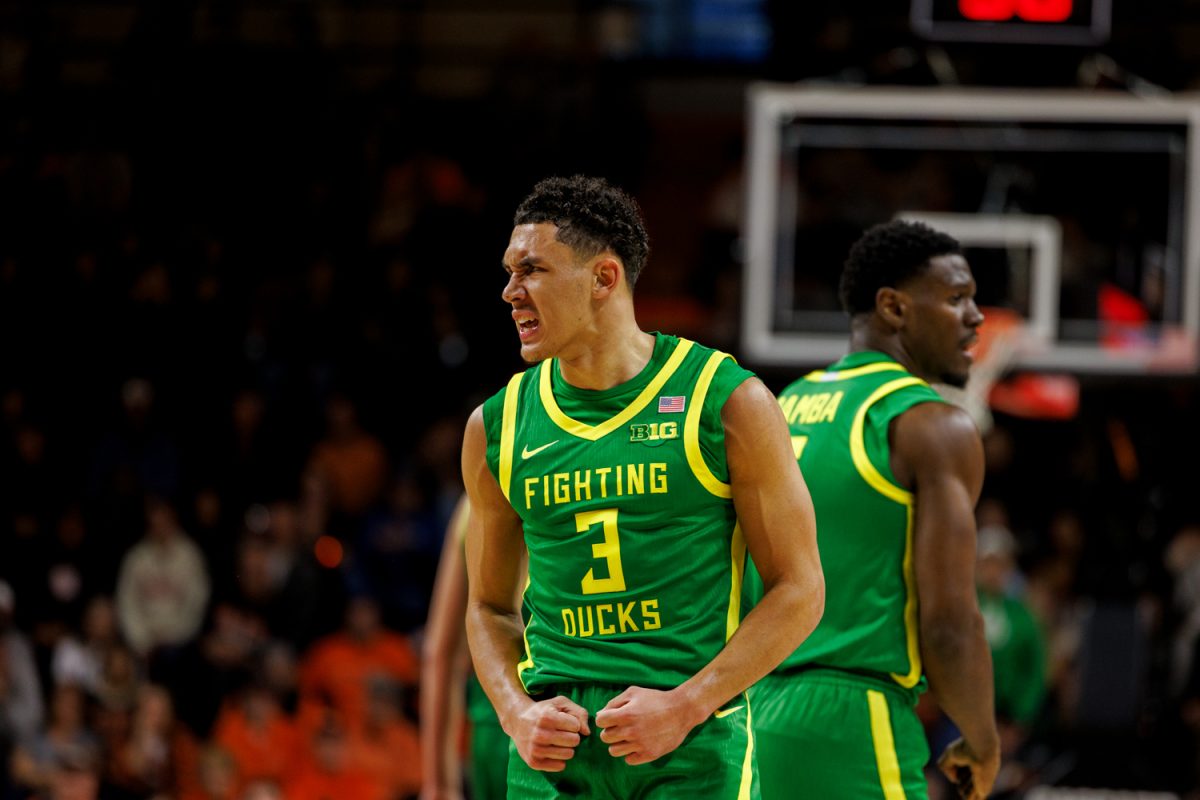 jackson Shelstad (3) celebrates the 3. The Oregon Ducks mens basketball team takes on the Oregon State Beavers on Nov. 21, 2024 in Gill Coliseum in Corvallis, Ore. (Darby Winter/Emerald)