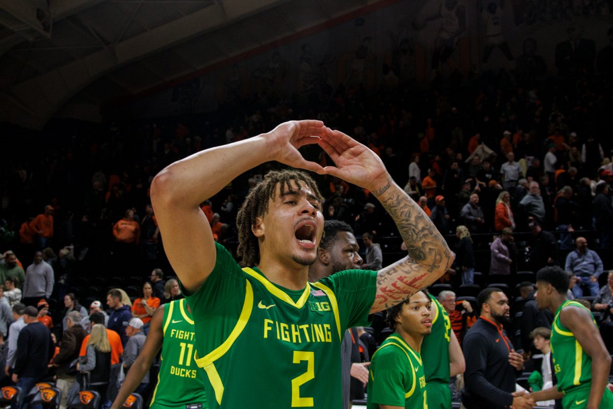 Jadrian Tracey (2) Throws the O after the win. The Oregon Ducks mens basketball team takes on the Oregon State Beavers on Nov. 21, 2024 in Gill Coliseum in Corvallis, Ore. (Darby Winter/Emerald)