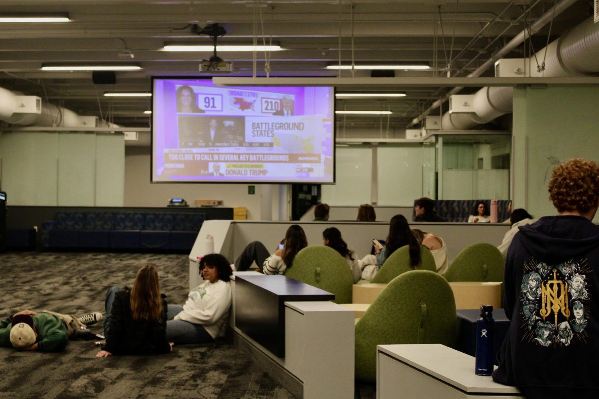 Students watch the 2024 Presidential election at Justice Bean Hall. 