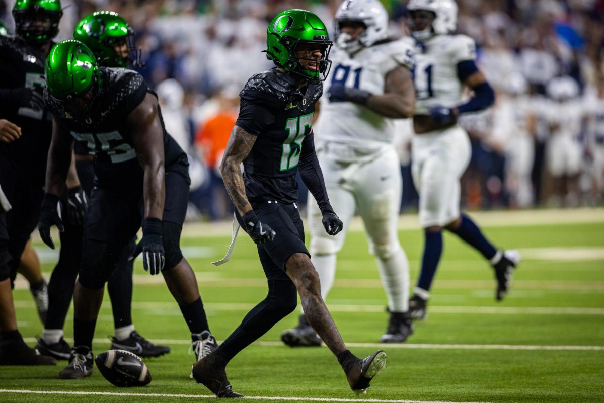 Tez Johnson (15) celebrates another big play  to move the Ducks down the field. The number 1 ranked Oregon Ducks take on the number 4 Penn State Nittany Lions on Dec. 7, 2024, at Lucas Oil Stadium in Indianapolis, IN. (Jonathan Suni/Emerald)
