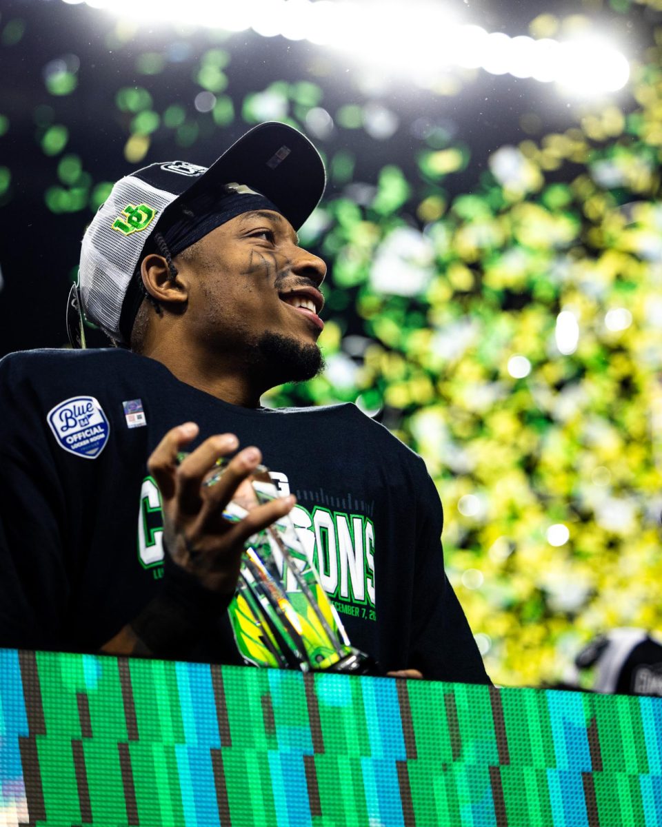 Tez Johnson soaks in the moment after being named the Big Ten Championship MVP. The number 1 ranked Oregon Ducks take on the number 4 Penn State Nittany Lions on Dec. 7, 2024, at Lucas Oil Stadium in Indianapolis, IN. (Jonathan Suni/Emerald)
