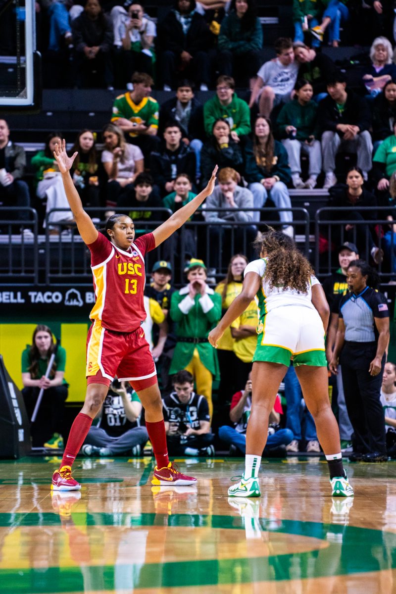 Rayah Marshall (13) defending against Ehis Etute (35). The University of Oregon Ducks Women's Basketball team lose to the University of Southern California Trojans (53-66) in a home match at Matthew Knight Arena in Eugene, Ore., on Dec. 7, 2024. (Rowan Campbell/Emerald).