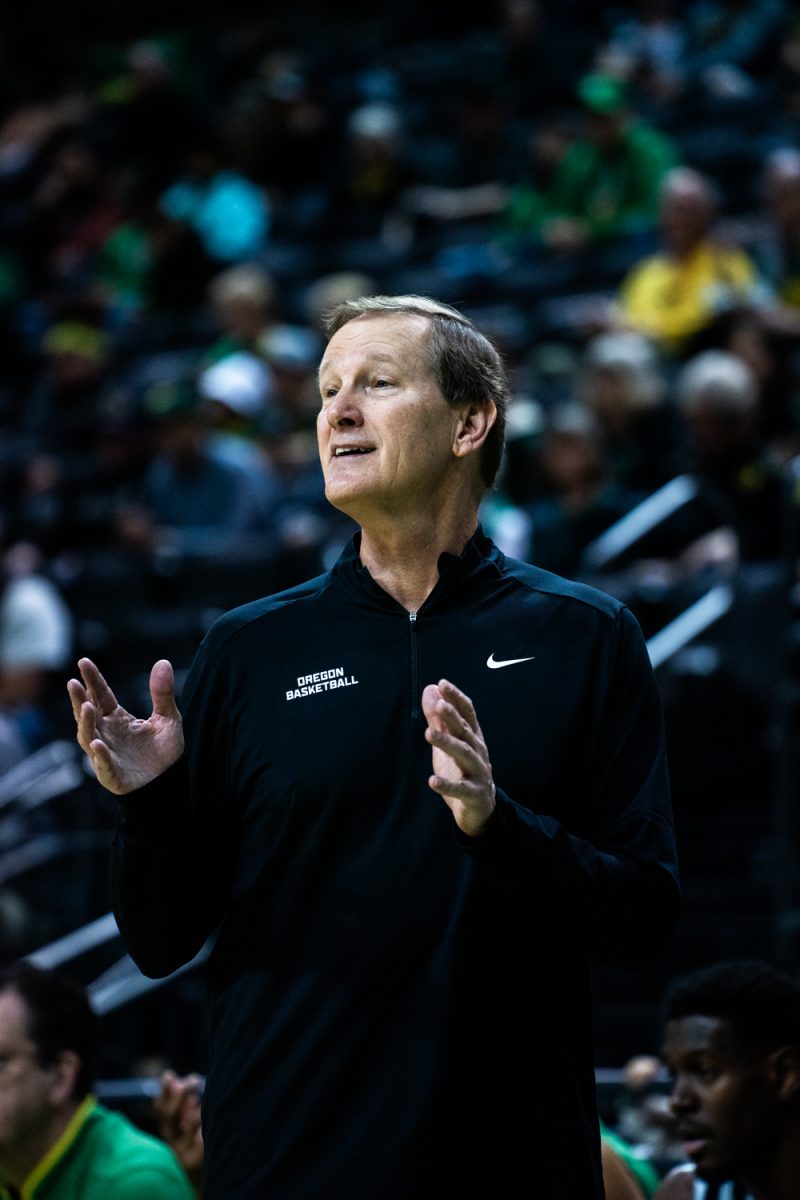 Dana Altman (HC) looks to the floor to talk with is players. The University of Oregon Ducks Mens Basketball team defeat the SFA Lumberjacks (79-61) in a home match at Matthew Knight Arena in Eugene, Ore., on Dec. 15, 2024. (Rowan Campbell/Emerald).