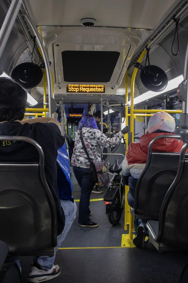 Passengers ride the EMX bus towards Agate Station in Eugene, Ore. (Alyssa Garcia/Emerald) 
