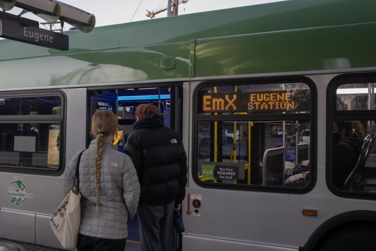 Passengers board the EMX at Agate Station heading towards Eugene, Ore. (Alyssa Garcia/Emerald) 