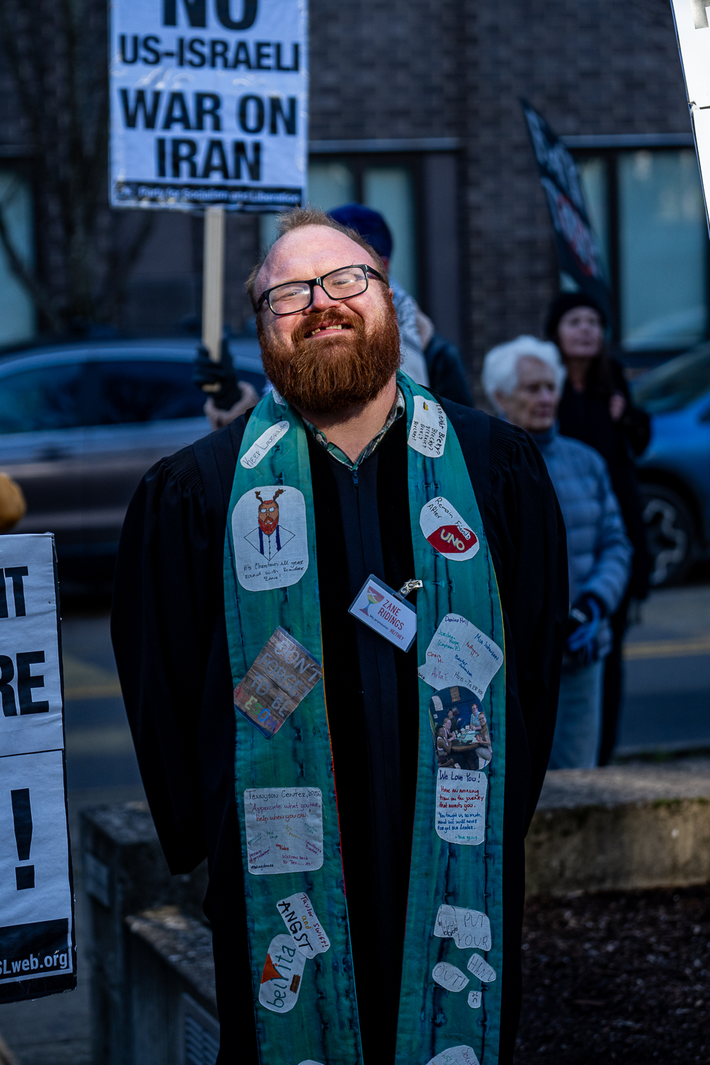 Protestors convine at the Wayne L. Morse U.S. Courthouse to be at the "We Fight Back" rally in Eugene, Ore. The protest started at 1pm on Jan. 19, 2025. Many had signs displaying messages for their protests. (Saj Sundaram/Emerald)