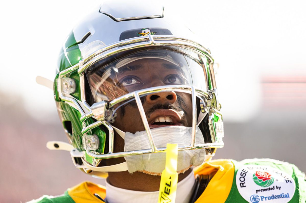 Oregon Ducks wide receiver Tez Johnson (15) gazes upward during pregame warmups ahead of the Rose Bowl. The University of Oregon Ducks Football team played the Ohio State University Buckeyes in the Rose Bowl at Rose Bowl Stadium in Pasadena, Calif., on Jan. 1, 2025, where they lost 41-21. (Max Unkrich/Emerald)