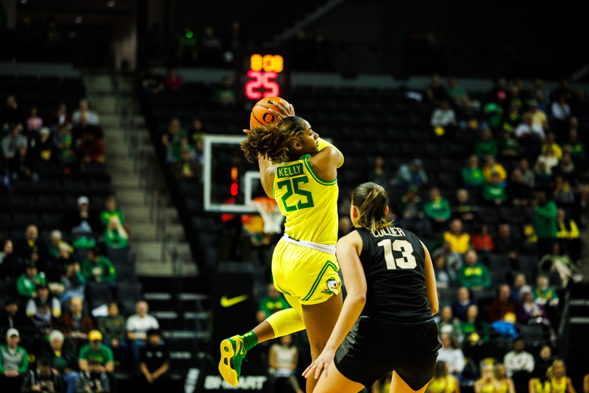 Deja Kelly (15) catcjes the high pass The Oregon Ducks Womens basketball team takes on the Purdue Boilermakers on Jan. 15, 2025 in MATT Knight Arena in Eugene, Ore. (Darby Winter/Emerald)