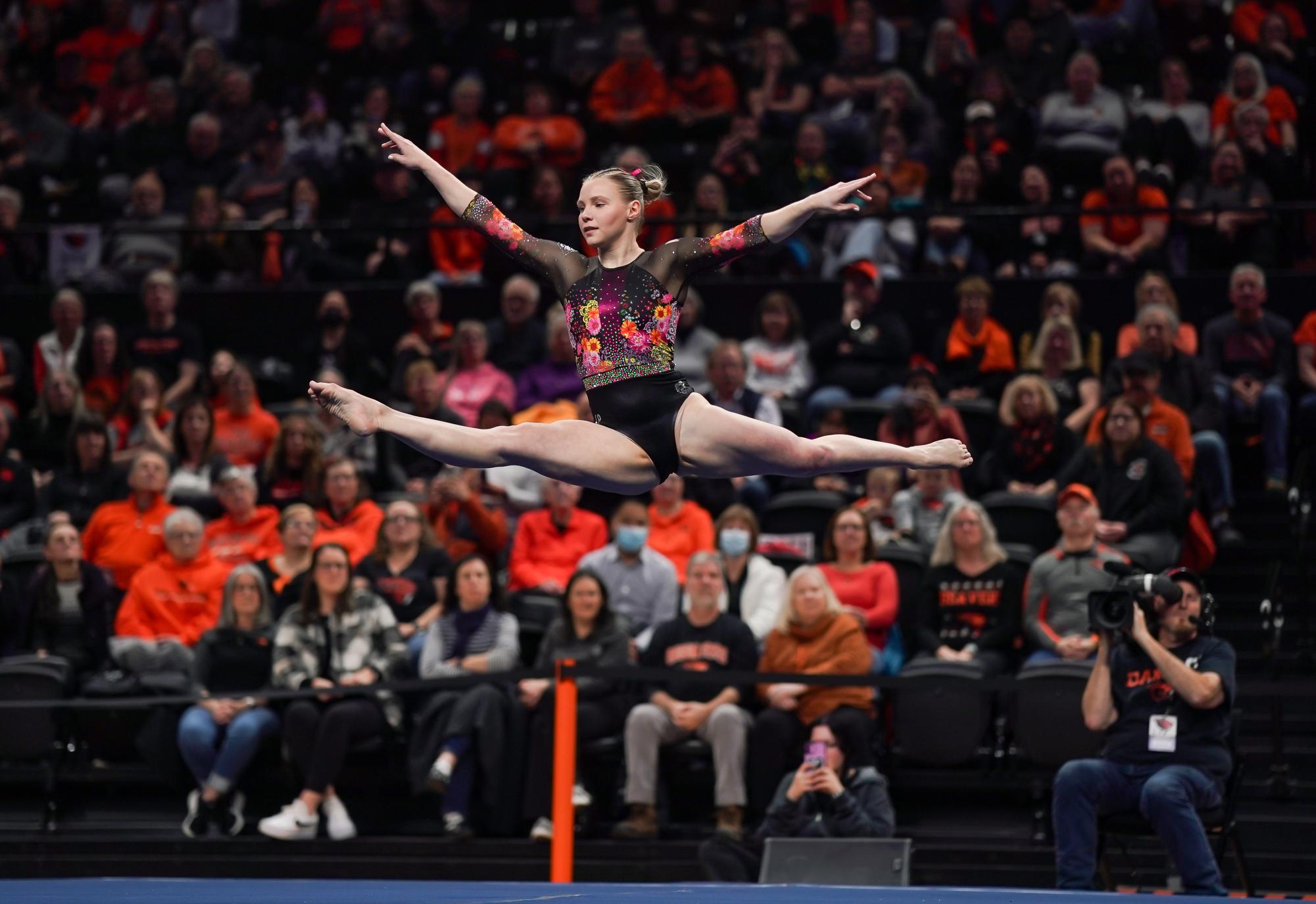 Oregon State’s Jade Carey performing a sissone during her floor routine. Jade Carey would go to score a 9.950 tying her for first place in the floor event. Jade Carey would also earn a 10.000 from one of the group of judges. Oregon State University Gymnastics hosts San Jose State University,Gill Coliseum, Corvallis Oregon, Jan. 17 2025. (Eddie Bruning/Emerald)