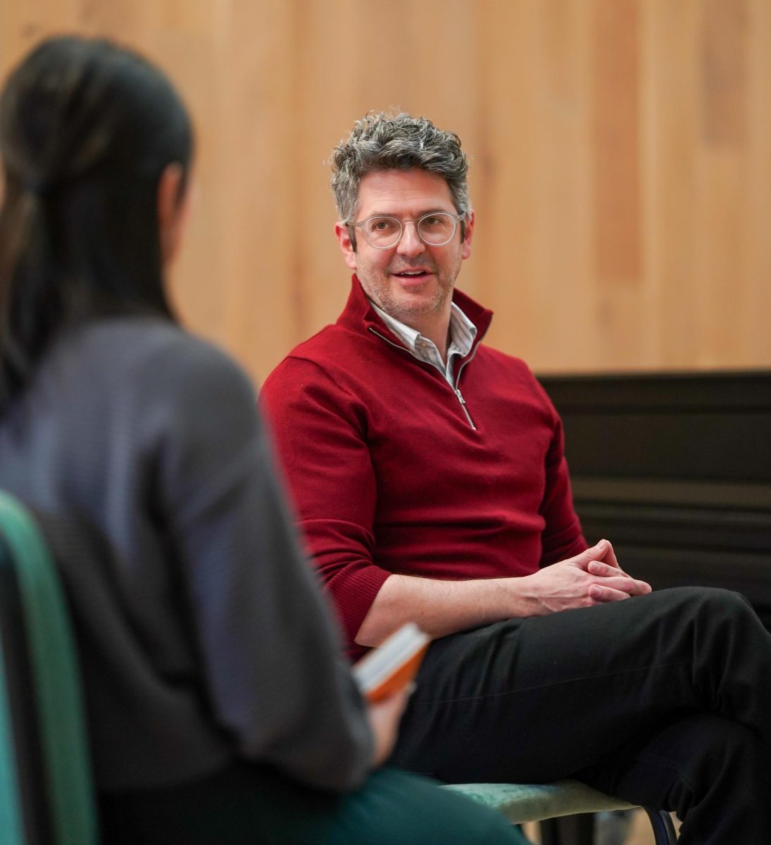 Stephen Rodgers discussing how the University of Washington is joining the University of Oregon for the Cascade Song Festival. The plan is to have the University of Washington host the event next year, and the University of Oregon will go to them. Cascade song festival, Berwick Hall in the Tykeson Rehearsal Hall, Eugene Oregon, Jan 21, 2025. (Eddie Bruning/Emerald)