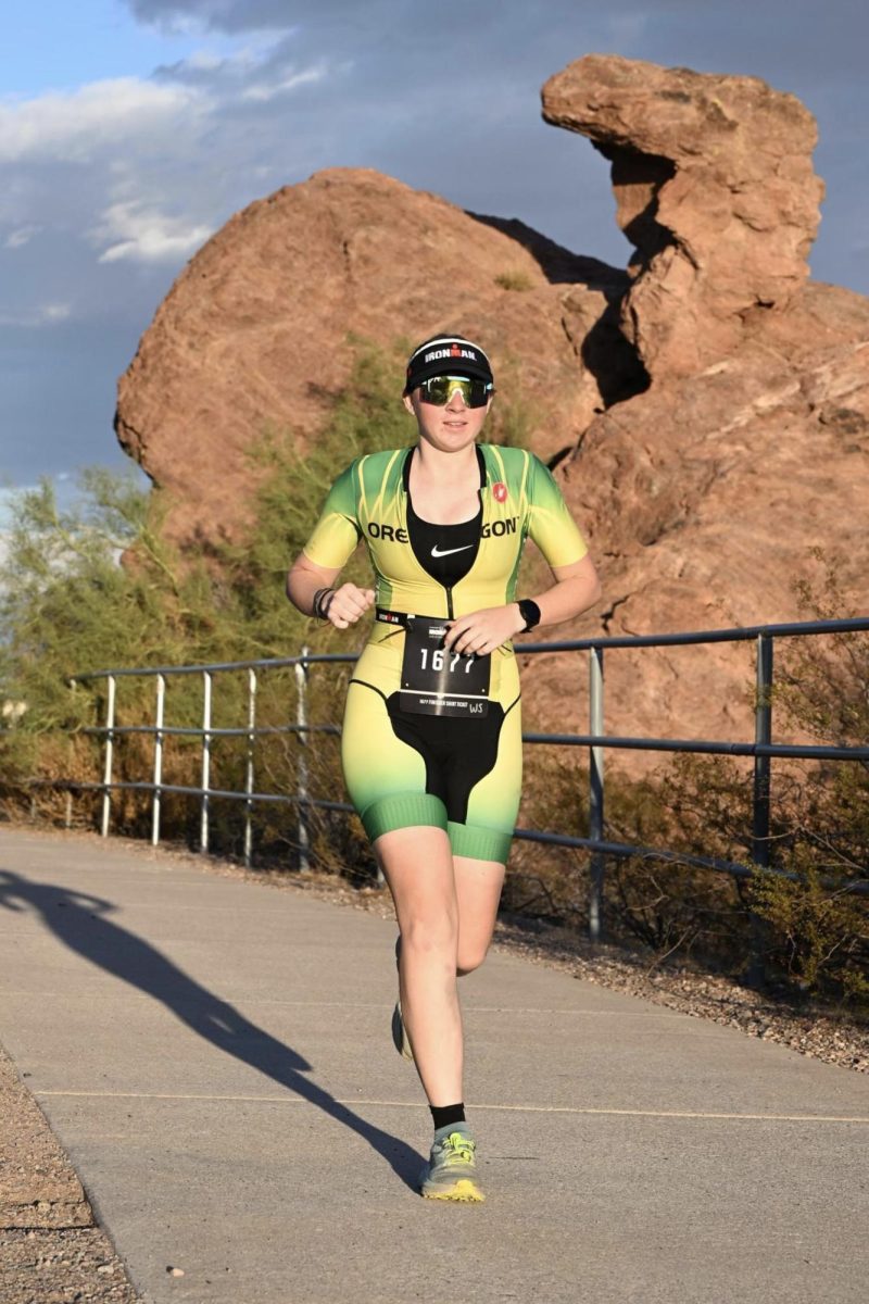 Miles-Colthup completes the running portion of Ironman Arizona, a 26.2 mile-long journey after first finishing a 2.4 mile swim and 112 mile bike ride. 