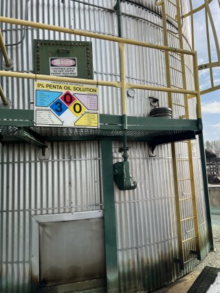 A chemical storage tank is seen here at the now-closed J.H. Baxter Wood Treating Facility in Eugene’s Bethel neighborhood. (Courtesy of the Environmental Protection Agency)
