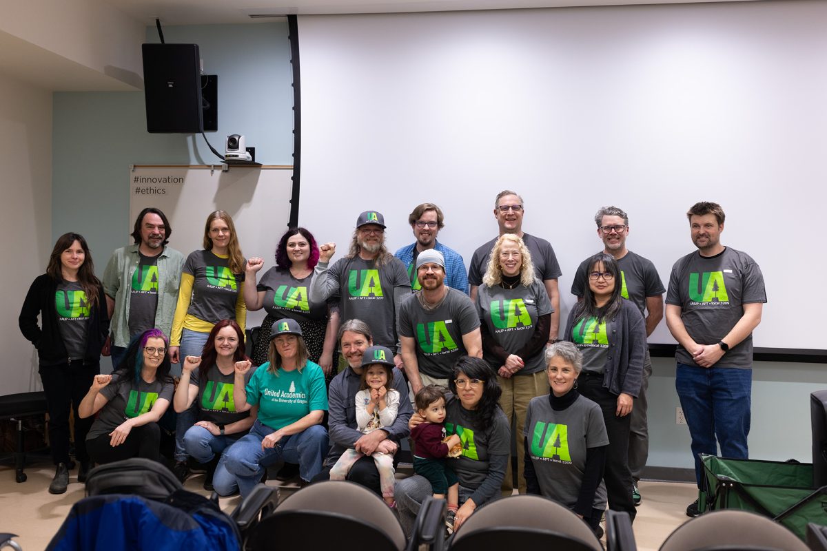 Members of The United Academics of the University of Oregon pose for a group photo. The United Academics of the University of Oregon held their once-a-term union meeting on Thursday, February 6. With the possibility of a strike in the air around week 10 of the winter term, the UA is preparing for what could be next. (Miles Cull/Emerald)