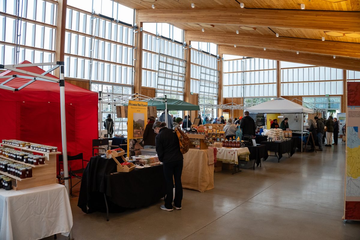 The Lane County Farmers Market has many different stands from different vendors, such as stands selling honey, jam, beeswax and popcorn. The Lane County Farmers Market is being held on Feb 1 to Mar 29, 2025, every Saturday from 10 A.M to 2 P.M. at the Farmers Market Pavilion on 8th and Oak Street. (Saj Sundaram/Emerald)