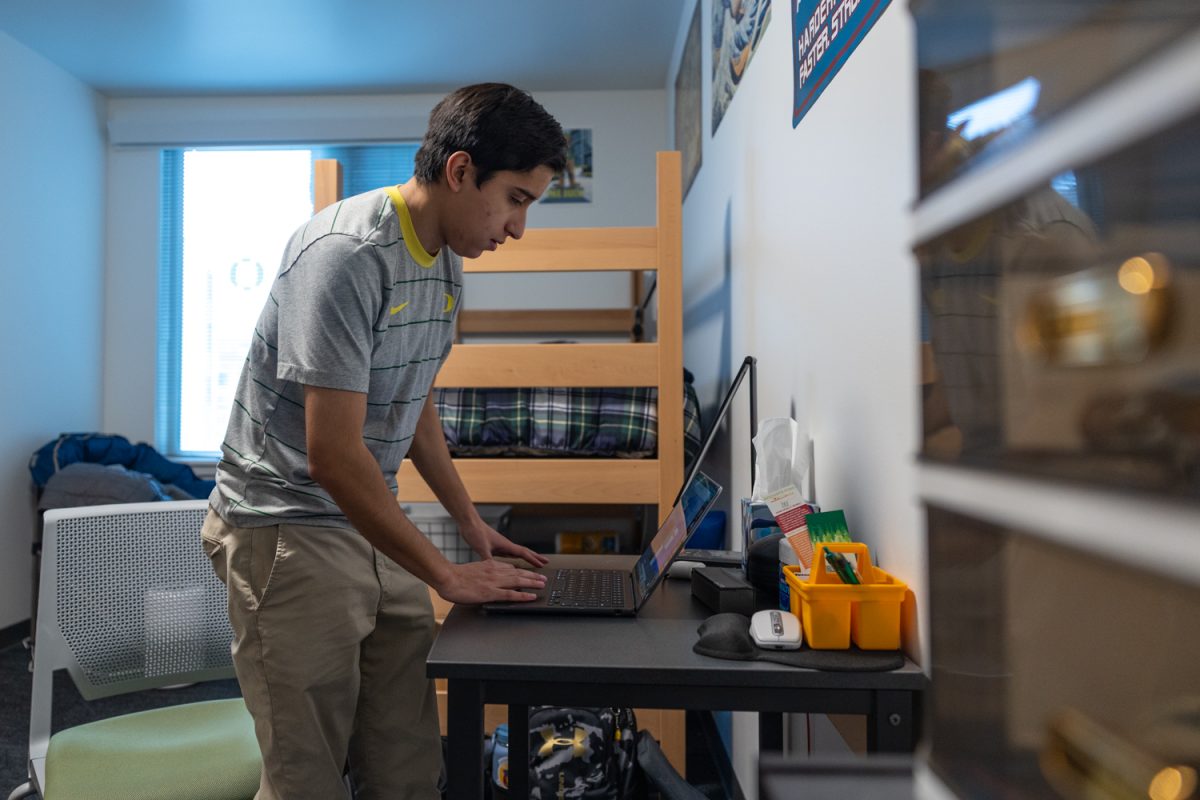 Cuauh Samano-Chavez, a sophomore Resident Assistant, poses for a portrait on Feb. 17, 2025 in the New Resident Hall at the University of Oregon. (Molly McPherson/Emerald)