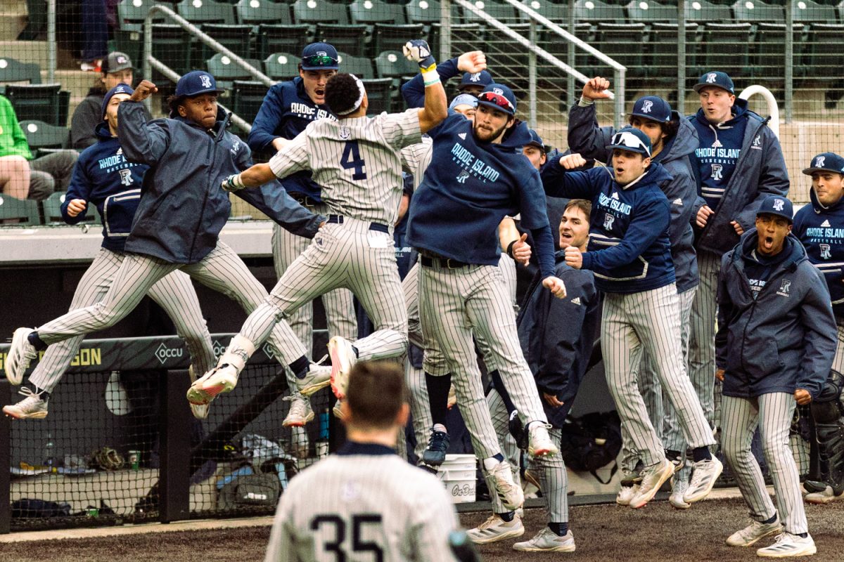 Rhode Island Rams outfielder Adonis Medina (4) celebrates with teammates after hitting homerun. Oregon baseball take on the Rhode Island Rams at PK Park in Eugene, Ore. on Feb. 21, 2025. (Eduardo Garcia/Emerald)