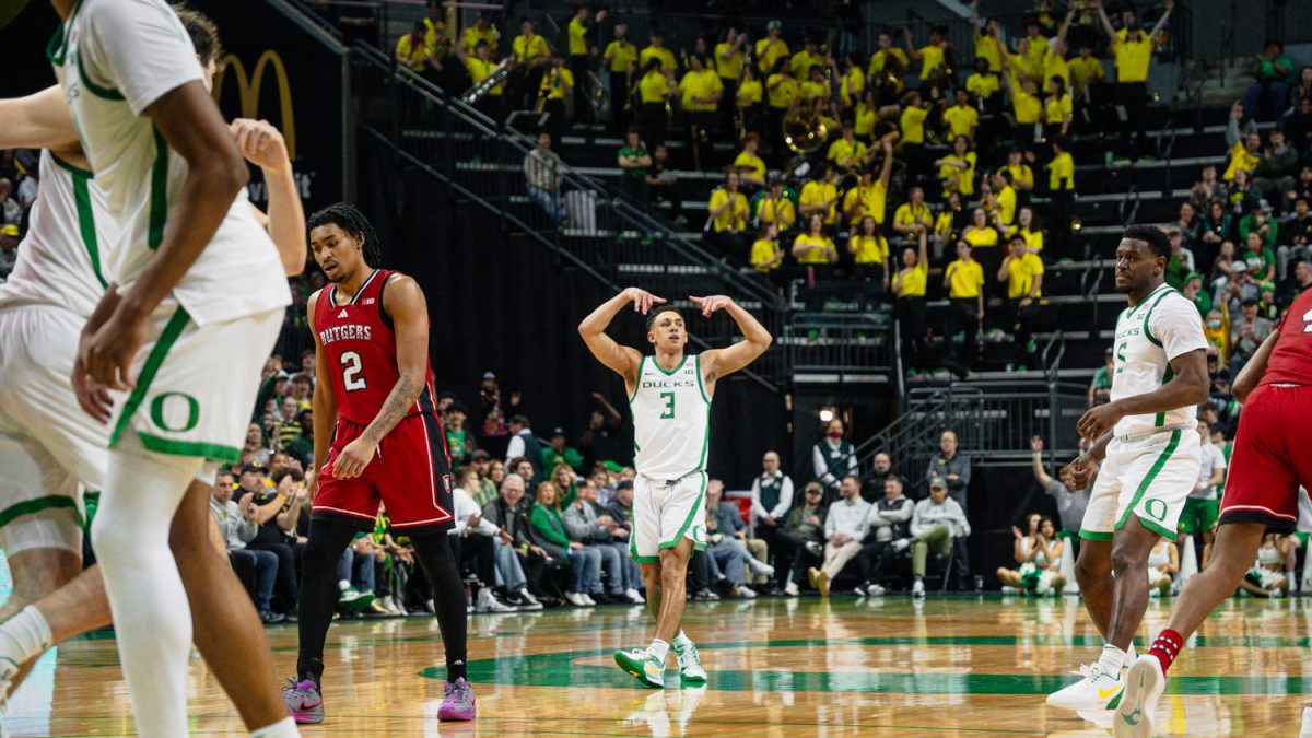 Jackson Shelstad (3) celebrates after making a consecutive 3-pointer in their game against Rutgers Feb. 16, 2025, in Eugene, Ore. (Jordan Martin/Emerald)