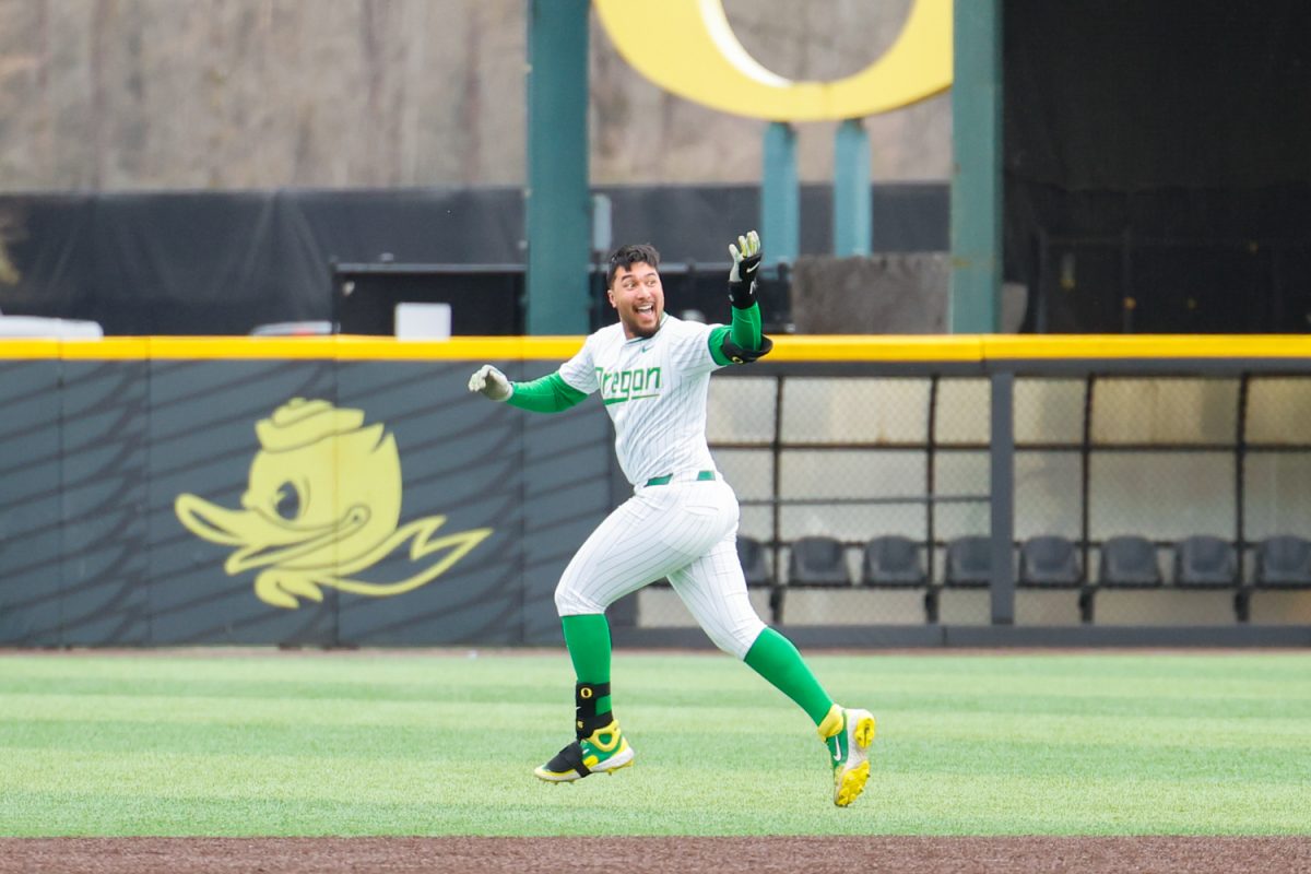 Dominic Hellman(45) Celebrates the win, The Oregon Ducks take on the Rhode Island Rams on Febuary 22nd at PK Park in Eugene, Ore. (Darby Winter/Emerald)