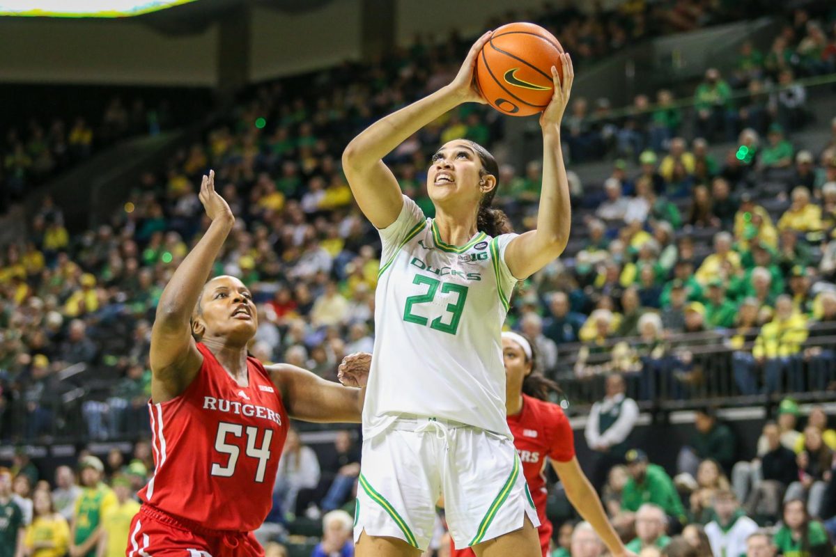 Sarah Rambus (23) tries a lay-in over Chyna Cornwell (54). Oregon Women’s Basketball takes on Rutgers in Eugene, Ore. on Feb. 23, 2025.
